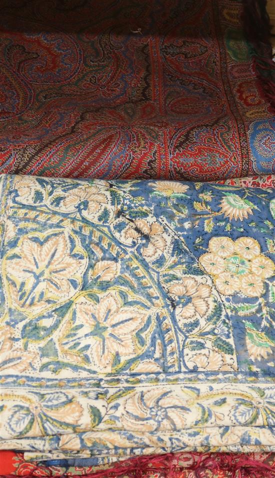 A 19th century Paisley shawl, another small shawl and a block printed Indian cotton cover
